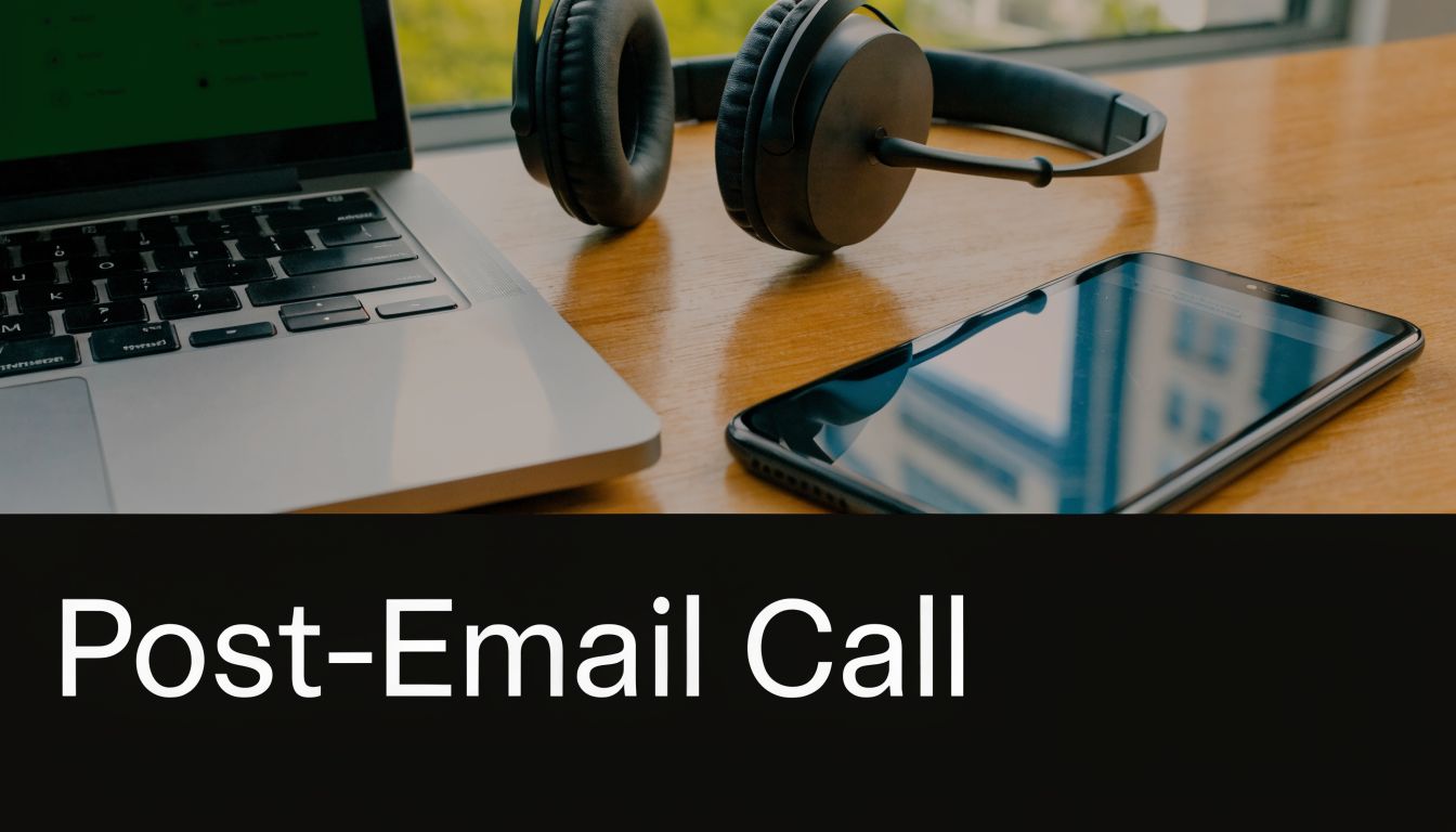 A modern desk workspace featuring a laptop, headphones, and a smartphone for professional post-email calls.